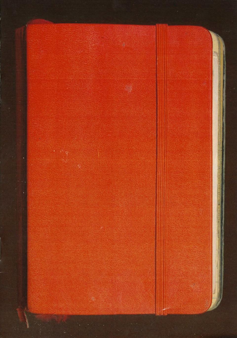 Picture of the cover of a red notebook