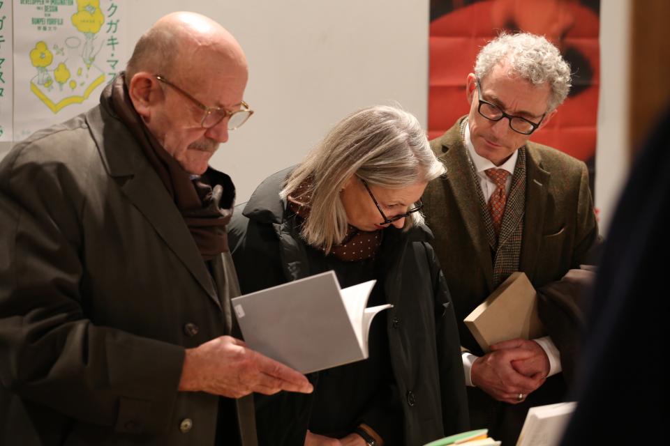 People with books in their hands